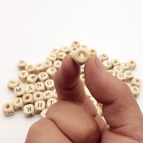 Wooden colored blocks with letters